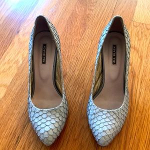 All black high heeled shoes